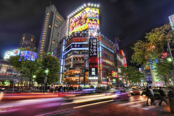 Bright lights of passing cars in Tokyo