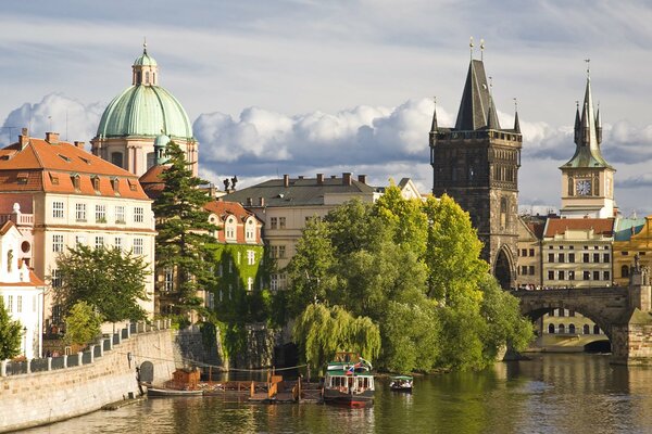 The historical center of Prague against a cloudy sky