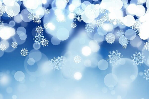 Falling snowflakes on a blue background