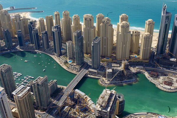 Dubai view of buildings connected by a bridge