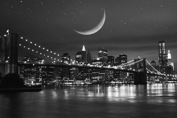 Lune et lanternes sur la ville de nuit