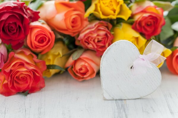 DIY white heart and bouquet of colorful roses