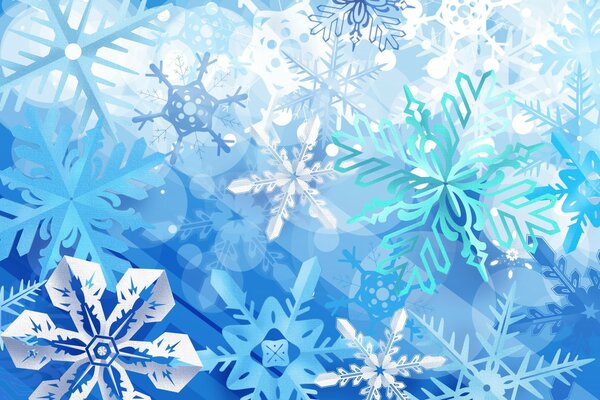 Niebieskie i białe świąteczne płatki śniegu