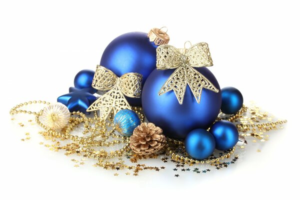 Boules bleues de Noël avec des perles d or et des arcs