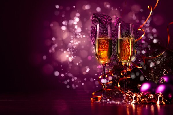 New Year s holidays champagne glasses and tinsel with bells