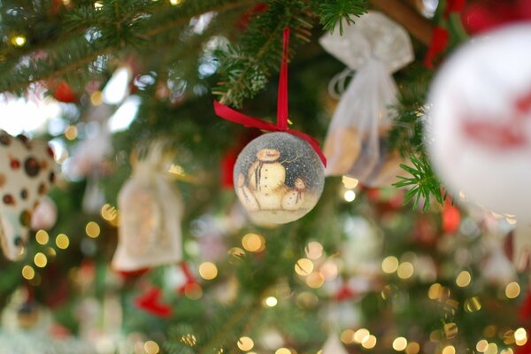 Christmas tree in lights garlands with balls