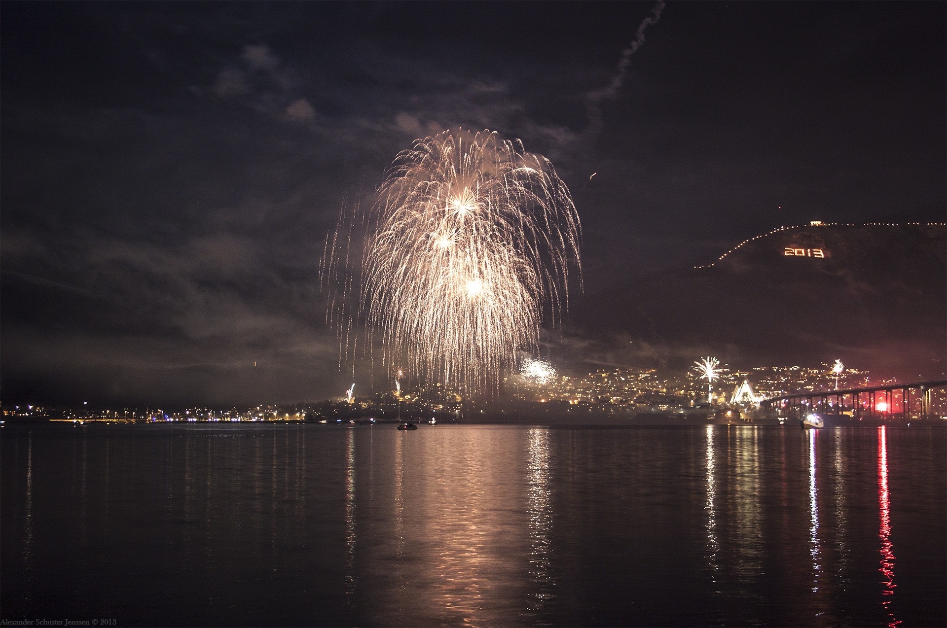 night new year river fireworks mountain light