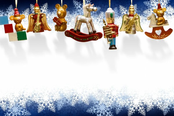 Giocattoli natalizi a forma di figure di animali color oro nella parte superiore, sfondo bianco al centro, sopra e sotto su sfondo blu fiocchi di neve bianchi