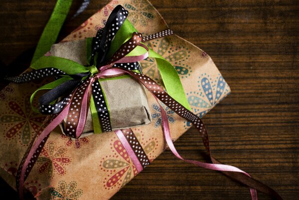 Gifts with a green ribbon and a large bow