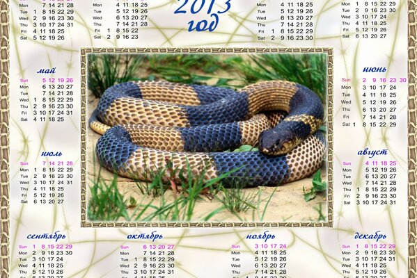 Calendario con el símbolo del año nuevo de la serpiente