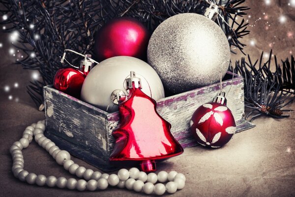 Christmas balls in a decorated box