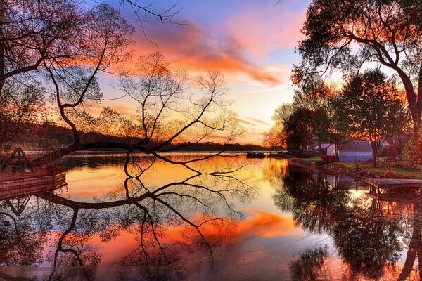 Orange sunset on the lake shore