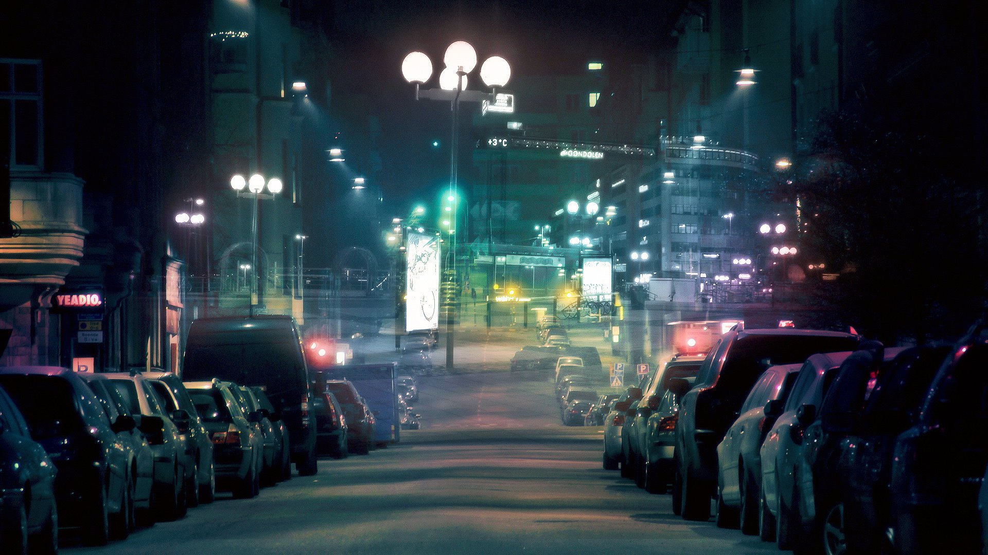 ulica miasto nocą samochody światła