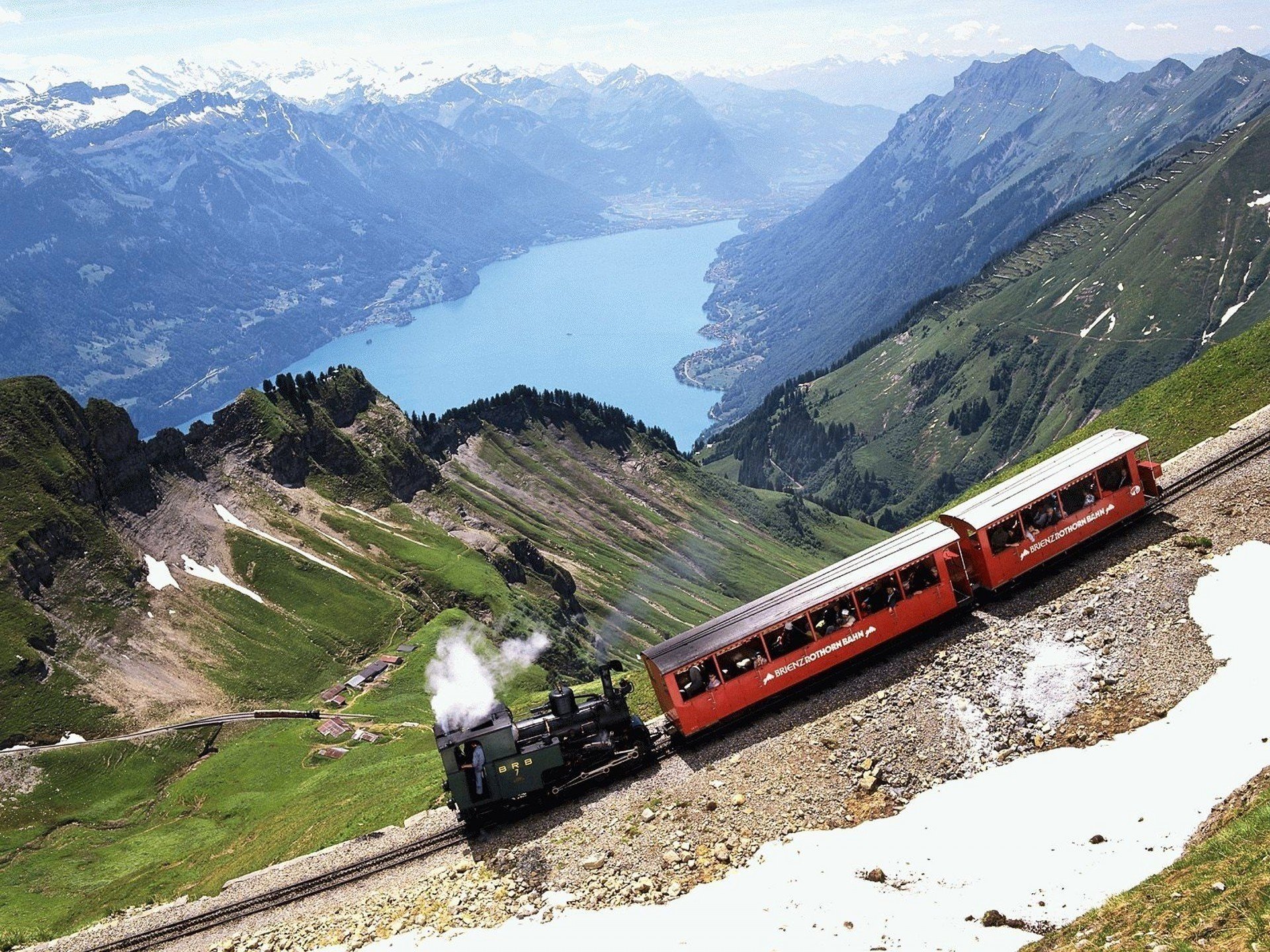 neige locomotive à vapeur montagnes rails lac