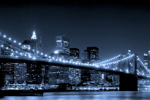 Puente de Brooklyn rascacielos de noche