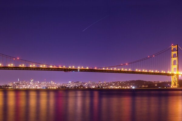 Bridge on the background of the evening landscape