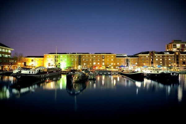 Lights of the port city in the night water