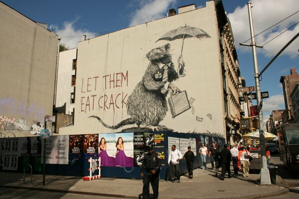 Graffiti sur la façade d un bâtiment avec l image d un rat