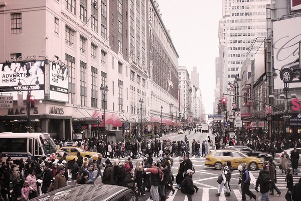 A New York street with a crowd of people