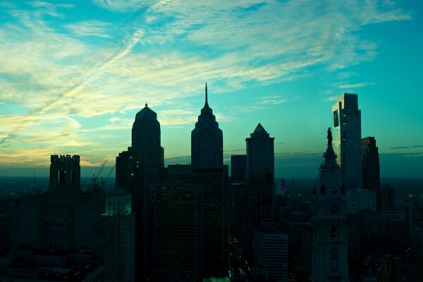 Black silhouettes of American skyscrapers