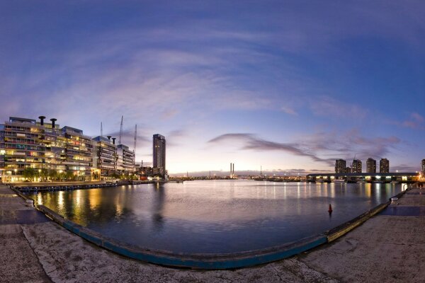 Evening city embankment in summer