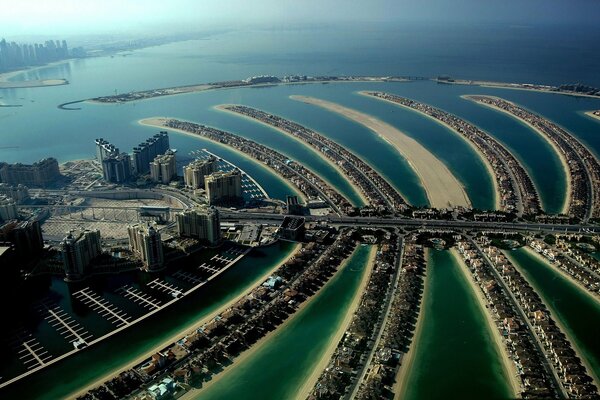 Artificial island, palm trees, houses