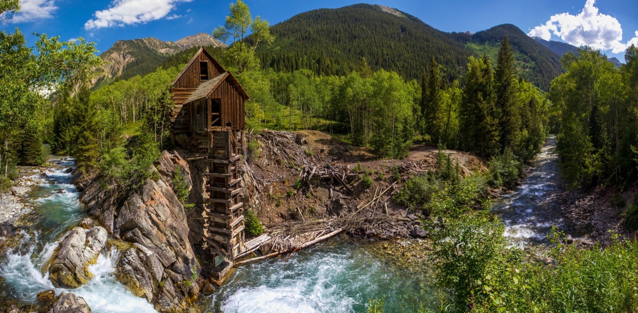 molino de agua cristal árboles bosque panorama colorado río montañas