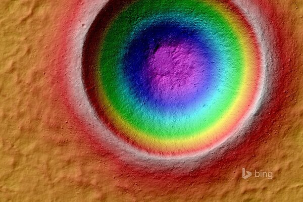 The crater of the moon is painted with rainbow colors
