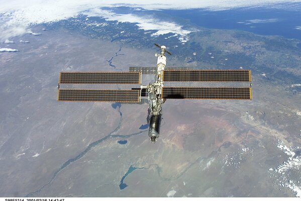 Photo of the space station on the background of the earth