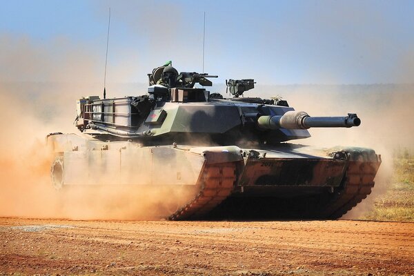 Abrams tank on the move with weapons