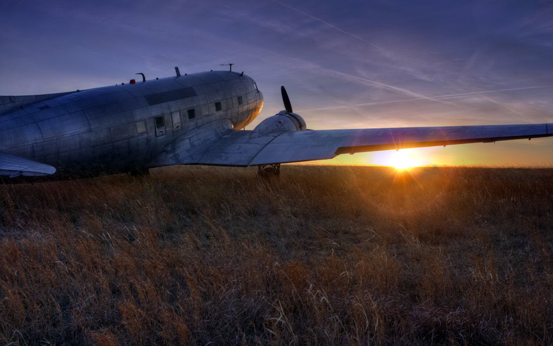 avión paisaje puesta de sol