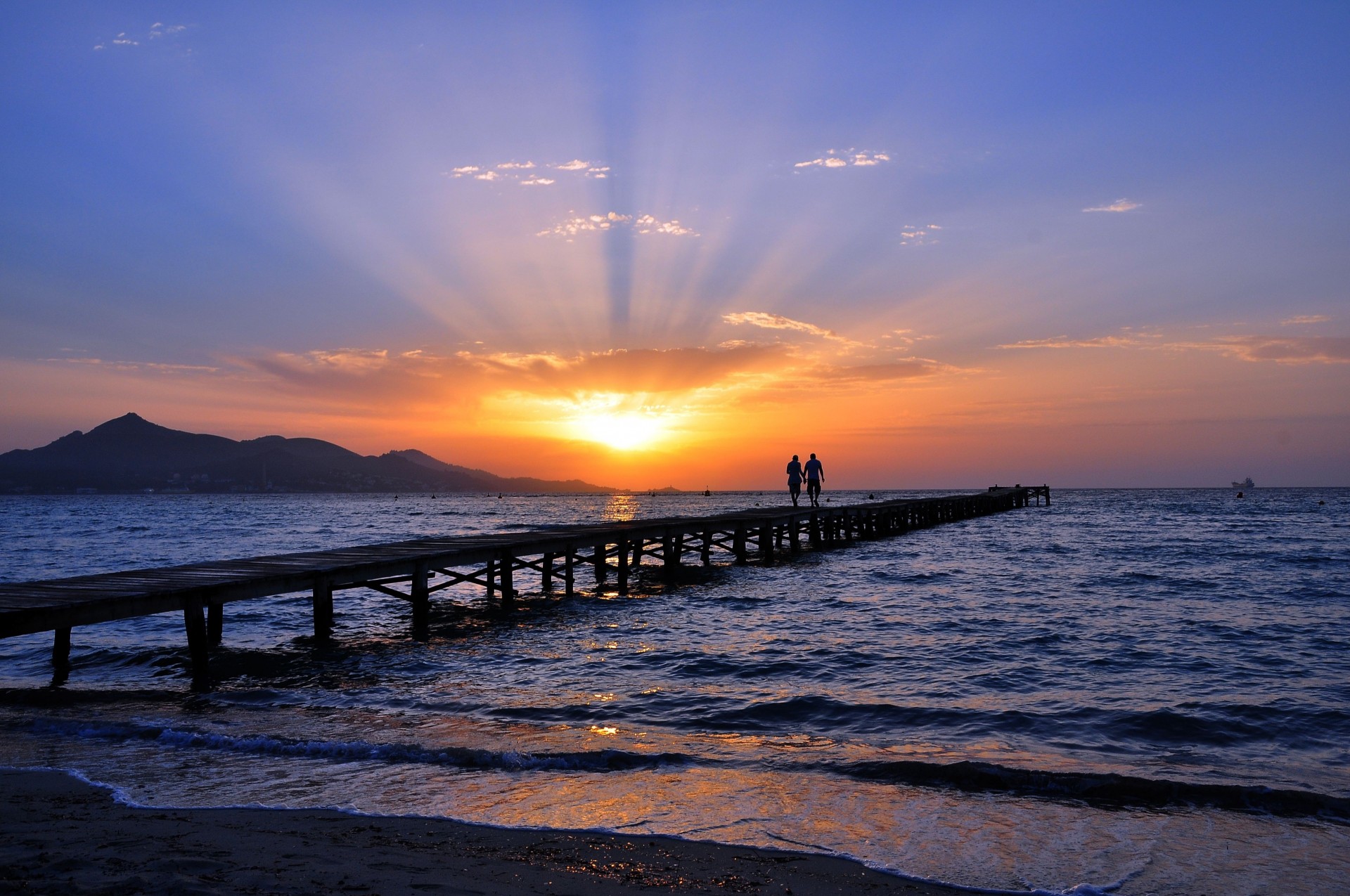 paesaggio mare spiaggia ponte tramonto