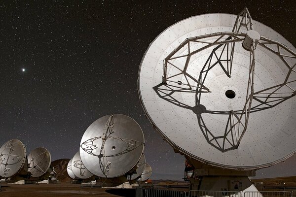 Telescopes on the background of the starry sky