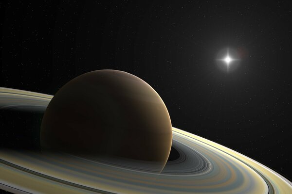 Anneaux de Saturne sur le fond d une étoile brillante dans l espace infini