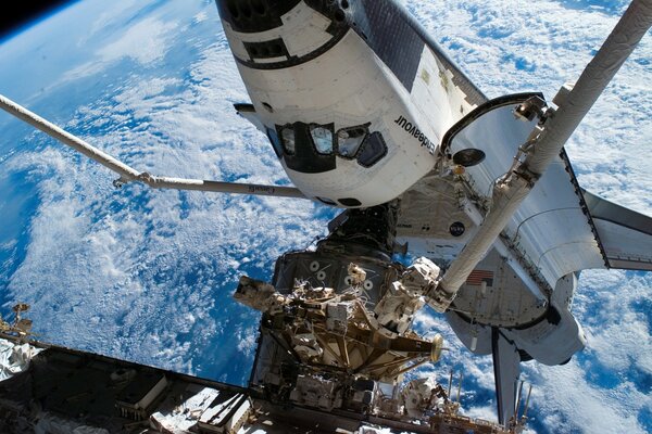 Space shuttle docked in orbit