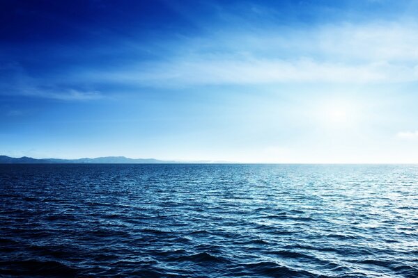 The sea with mountains on the horizon