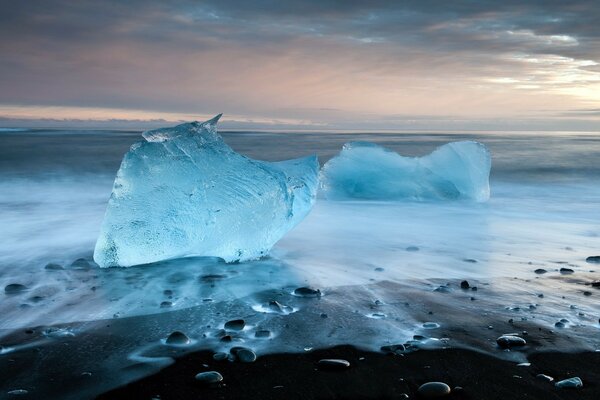 Blocks of ice on the sea in the evening