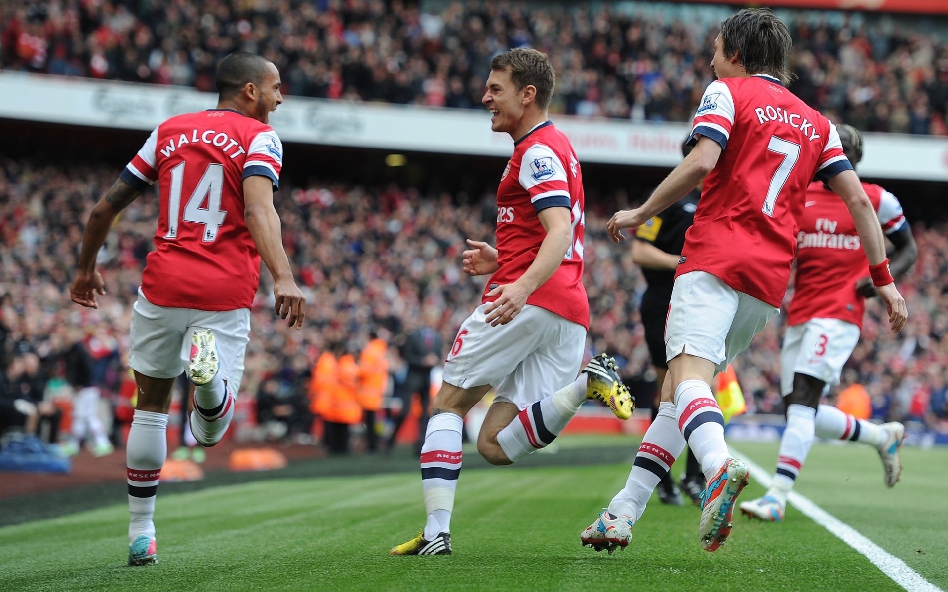 arsenal club de fútbol gunners jugadores theo walcott ramsey tomasz rosicki bakari sanya gradas fondo