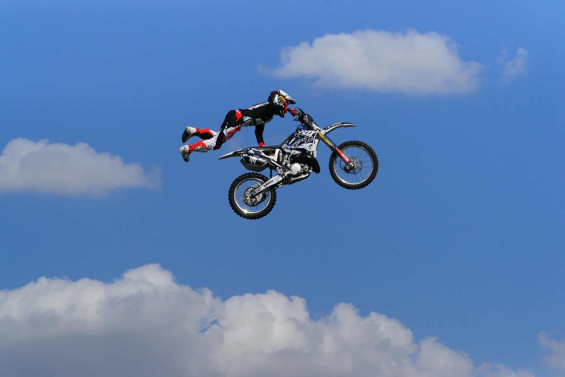 bike motocross jump men clouds sky