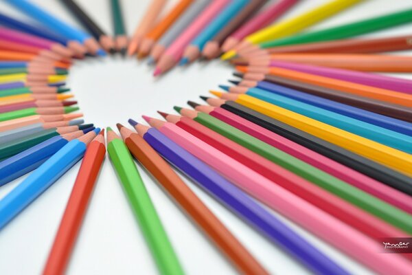 A large number of colored pencils