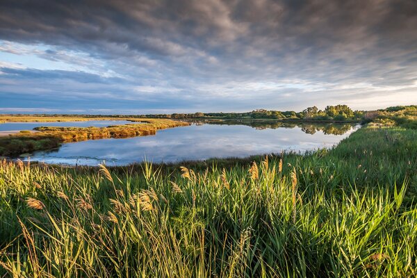 A magnificent landscape with a lake and boundless sky