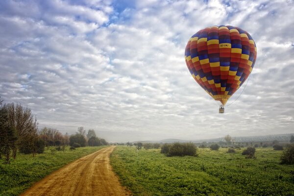 Hot air balloon flight over the bushes