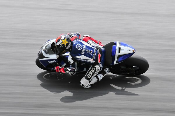 A motorcyclist is moving along the highway, top view