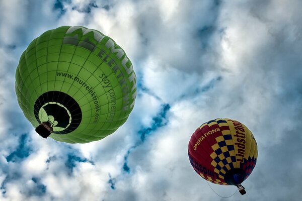 Two balls flying in the sky