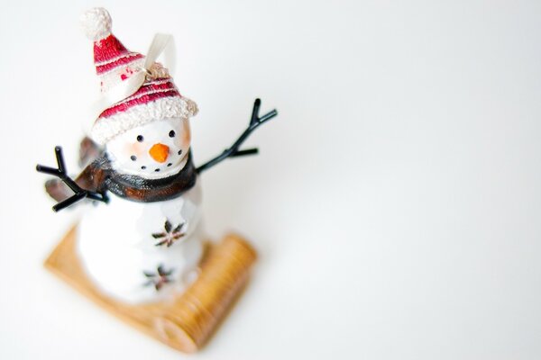 A toy in the form of a winter snowman