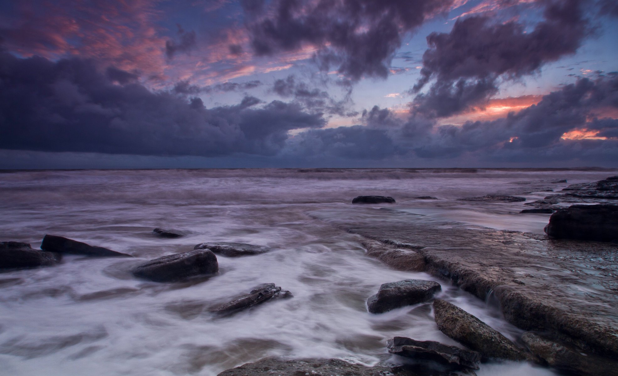 großbritannien steine küste meer sonnenuntergang wales abend