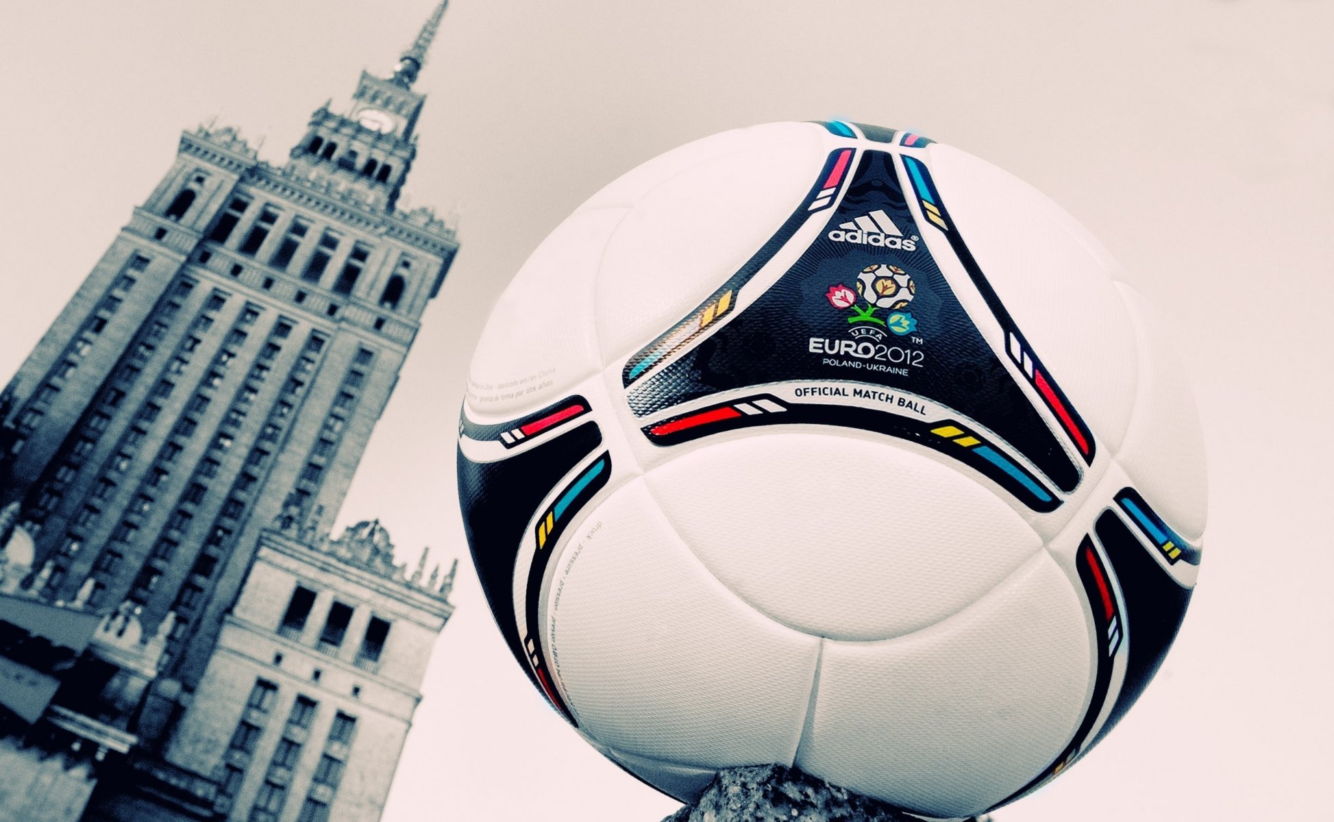 tango 12 angle football ball leather euro 2012 poland warsaw stalin skyscraper construction watches tower high-rise building window warszawa ukraine euro 2012 building adidas company logo mark emblem