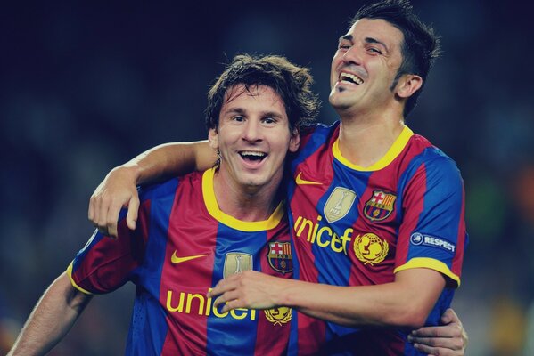 Esta foto muestra a David Villa y su mejor amigo Messi, el uniforme del FC Barcelona