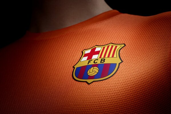 Das Logo des FC Barcelona. Auf einem T-Shirt