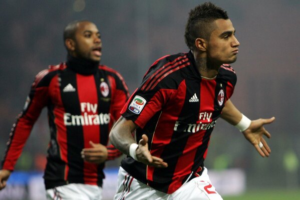 Boateng and the Prince. Football field